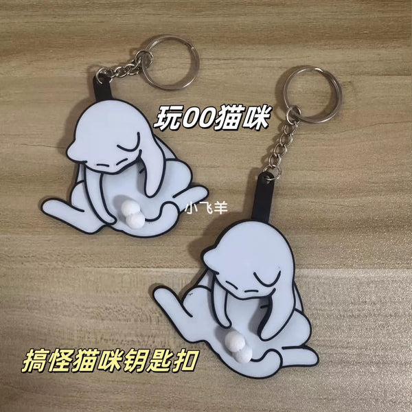 Naughty Kitty Keychain - Funny Egg-Playing Cat Gift