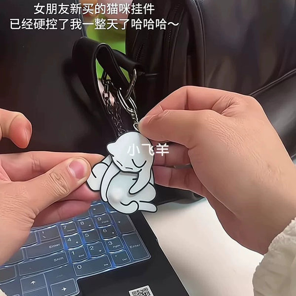 Naughty Kitty Keychain - Funny Egg-Playing Cat Gift